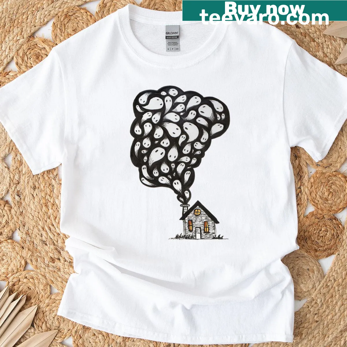T-shirt with an eerie ghoul house illustration — on a men's t-shirt