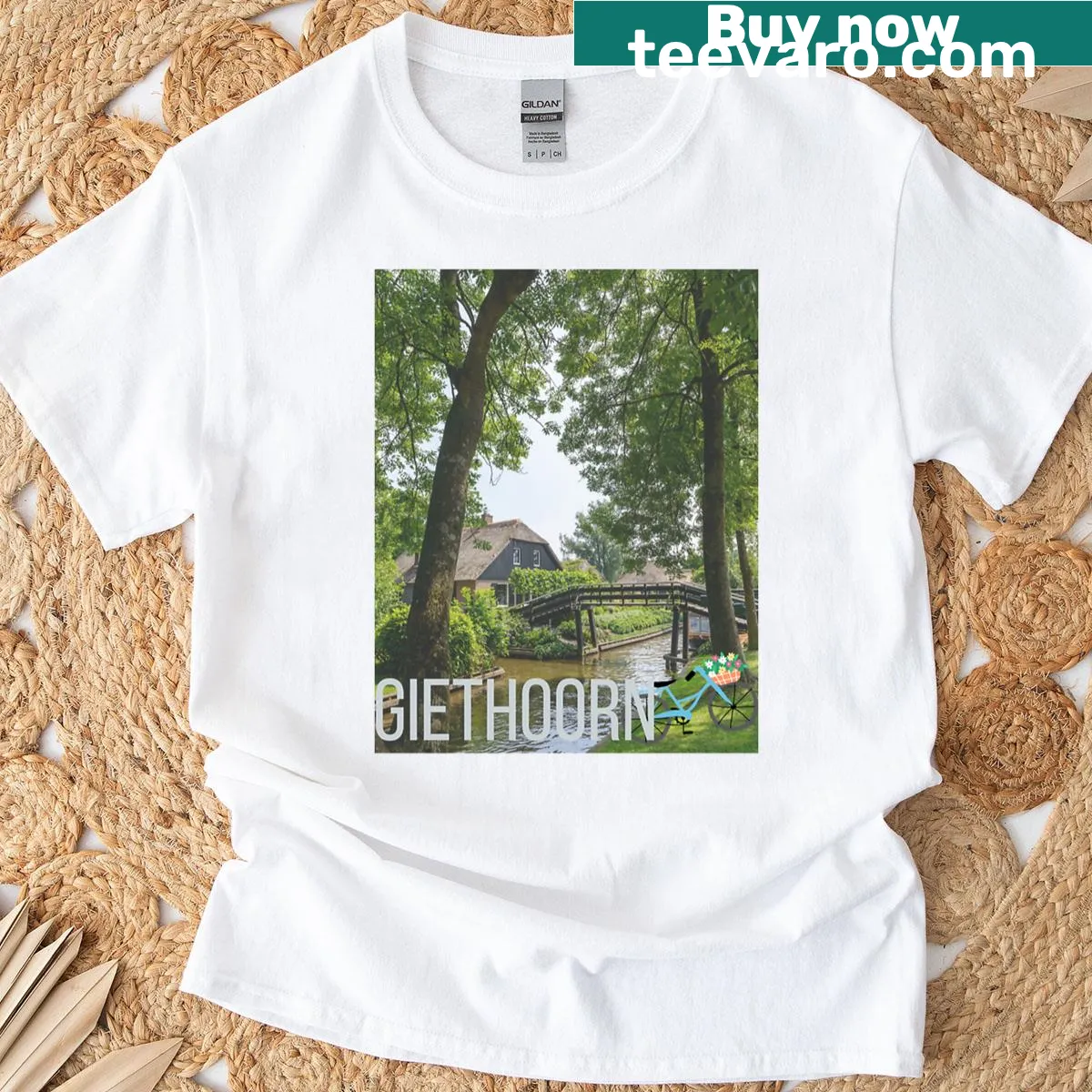 Illustrated Giethoorn t-shirt featuring scenic canal graphics — on a men's t-shirt