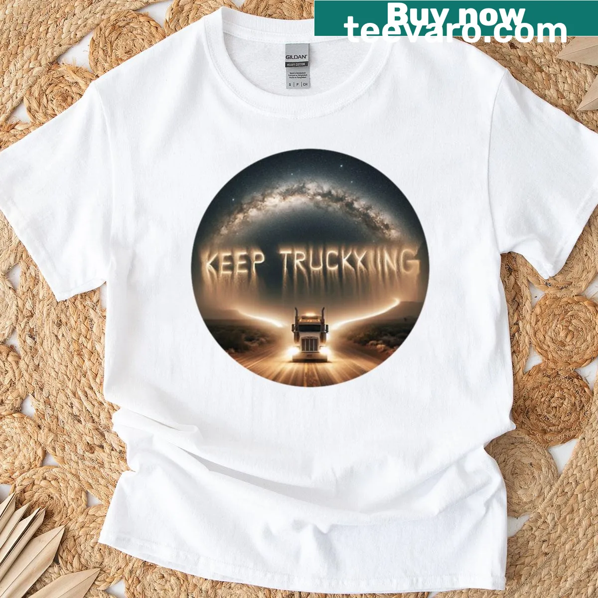 Bold typography T-shirt featuring a truck graphic and the words 'Keep Trucking' — on a men's t-shirt