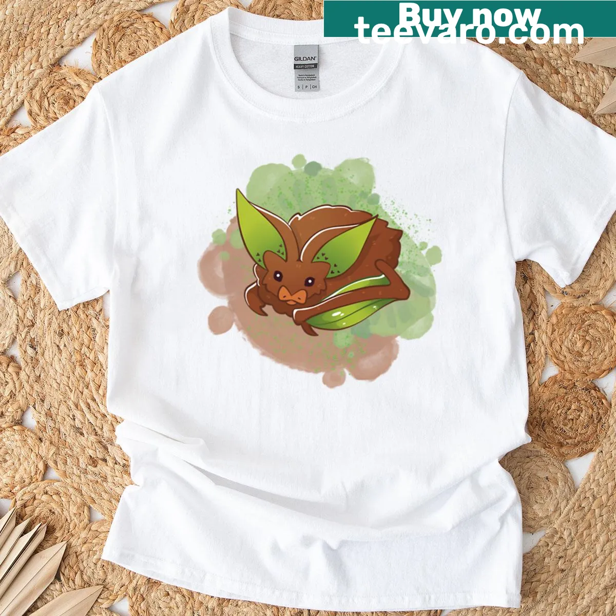 Cartoon T-shirt featuring a cute kiwi bat graphic. — on a men's t-shirt