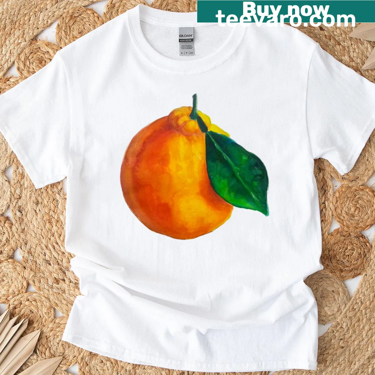 Watercolor painting of an orange on a t-shirt — on a men's t-shirt