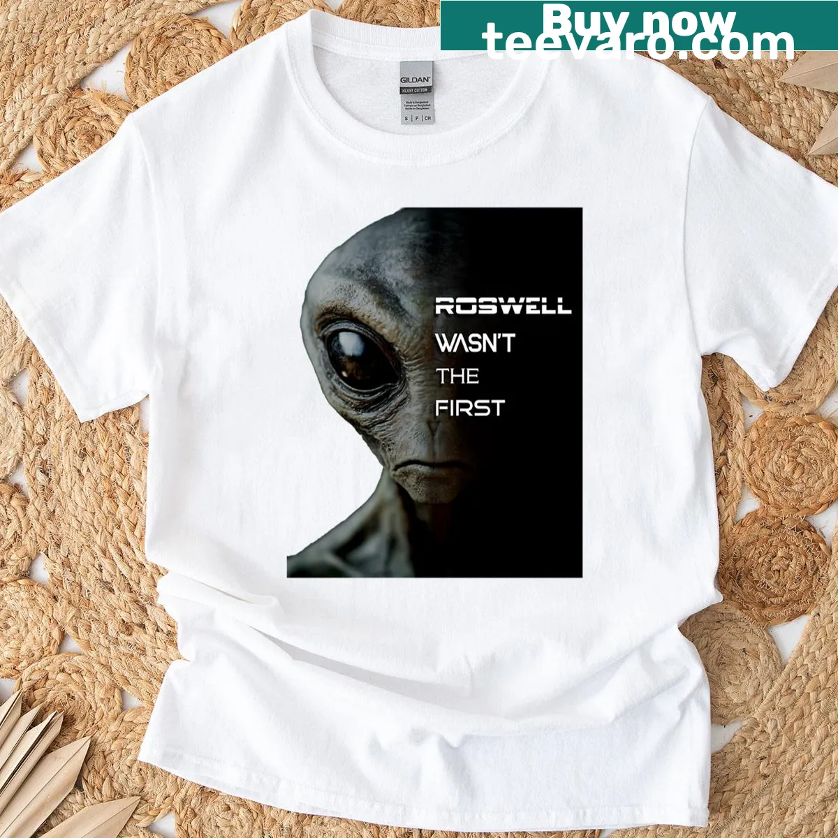 Bold typography t-shirt stating Roswell Wasn't The First — on a men's t-shirt