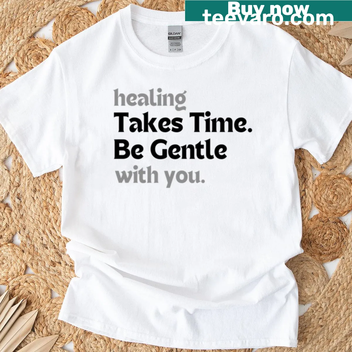 Minimalist t-shirt featuring a self-care quote about healing — on a men's t-shirt