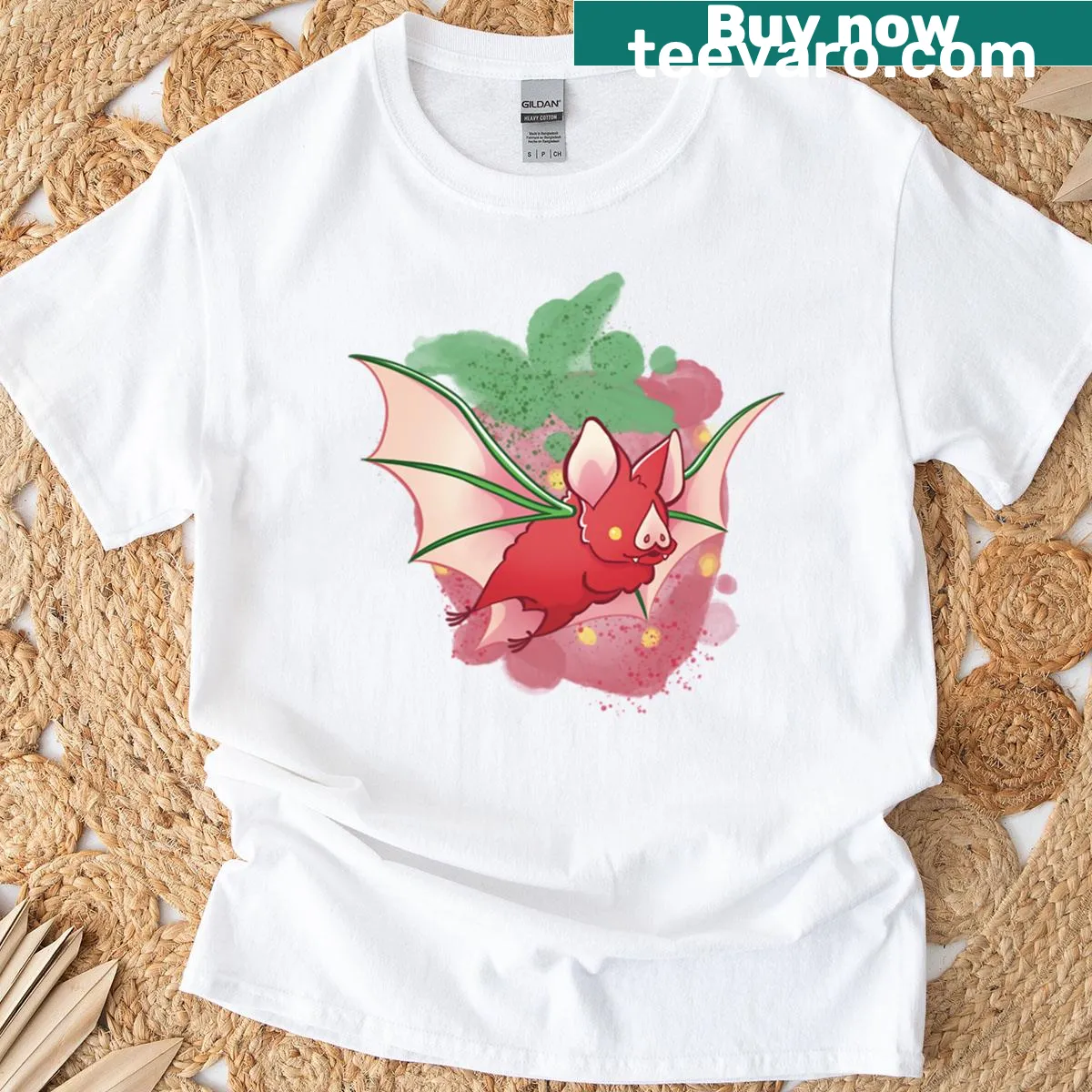 Cute T-shirt with a whimsical bat and strawberry illustration — on a men's t-shirt