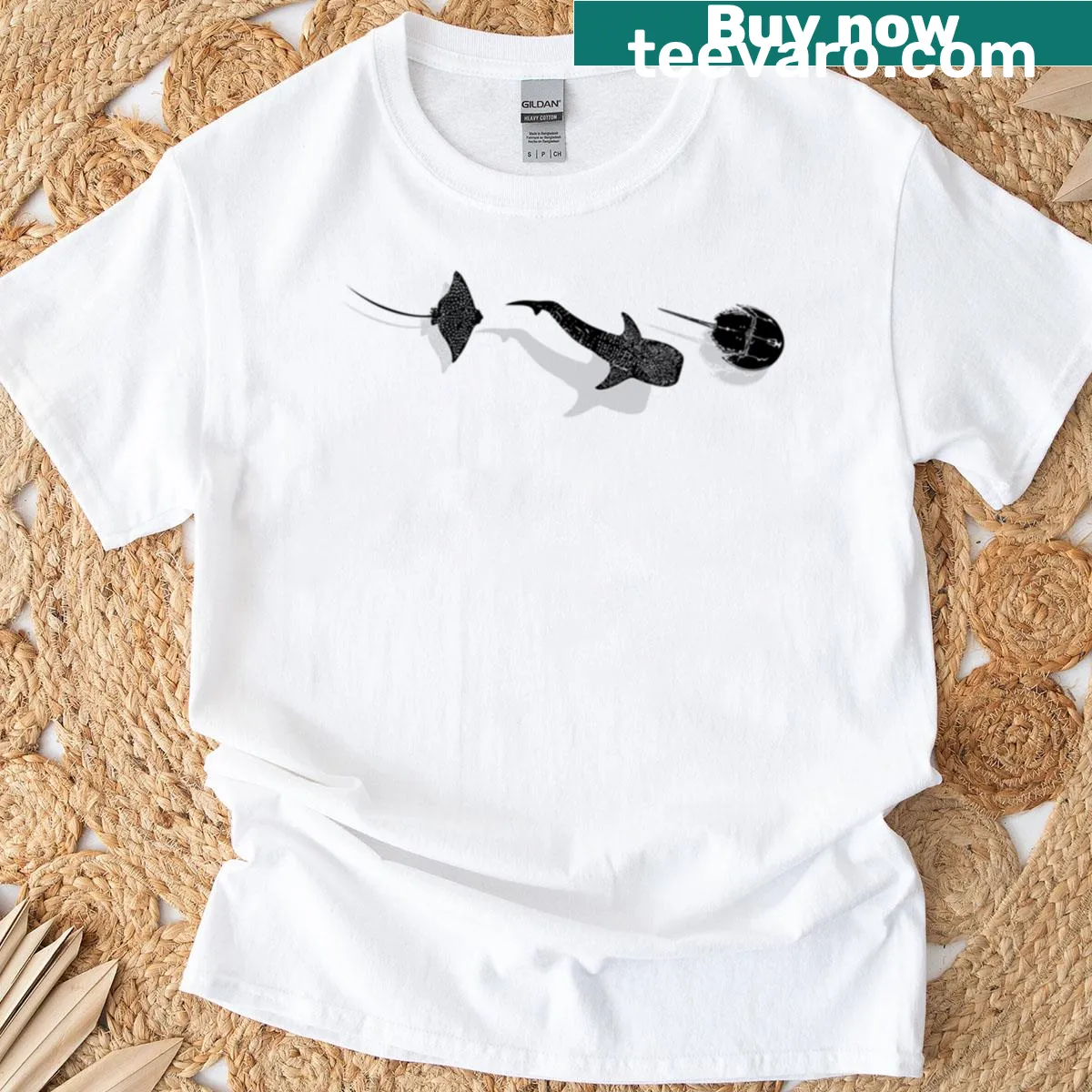 Illustration of sharks and crabs depicting an underwater scene — on a men's t-shirt