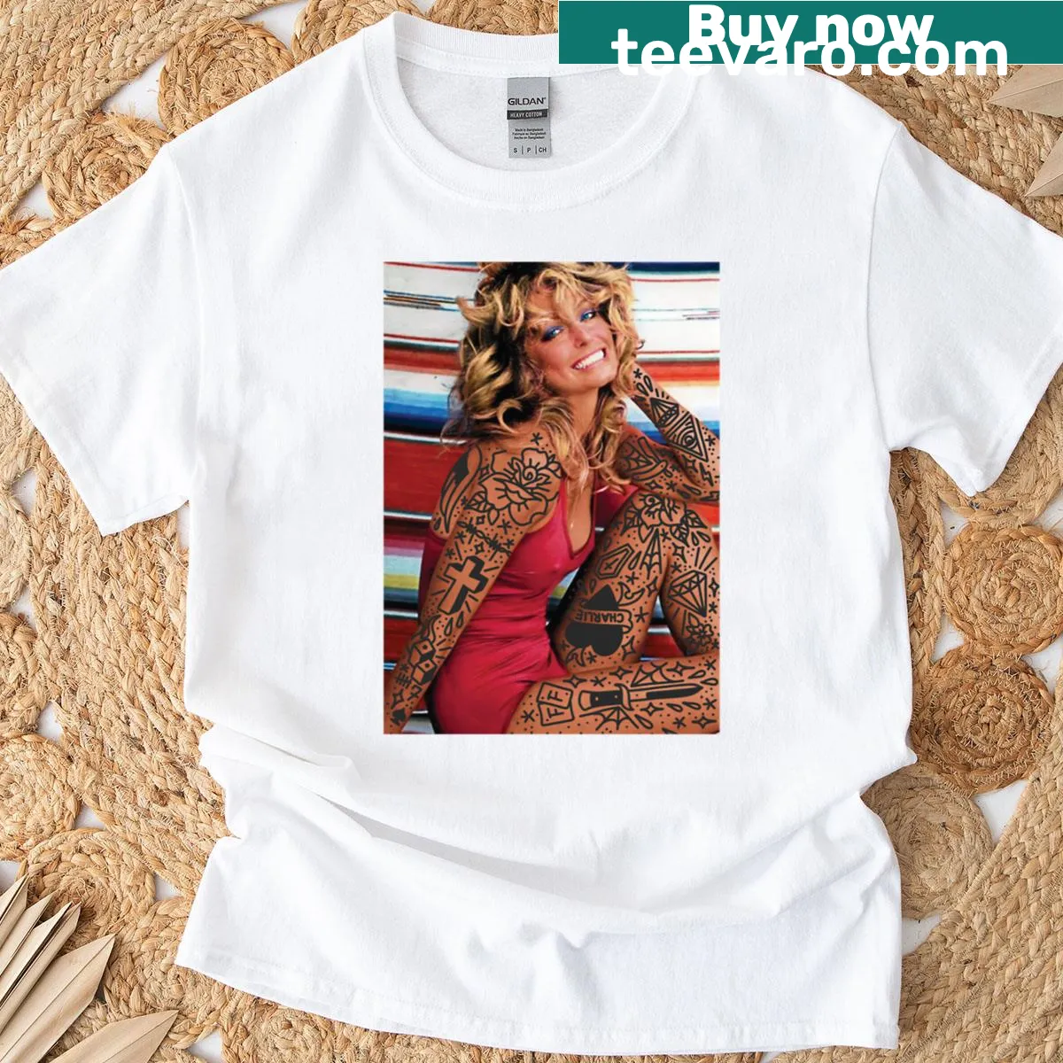 Graphic t-shirt featuring a tattooed portrait of Farrah Fawcett — on a men's t-shirt