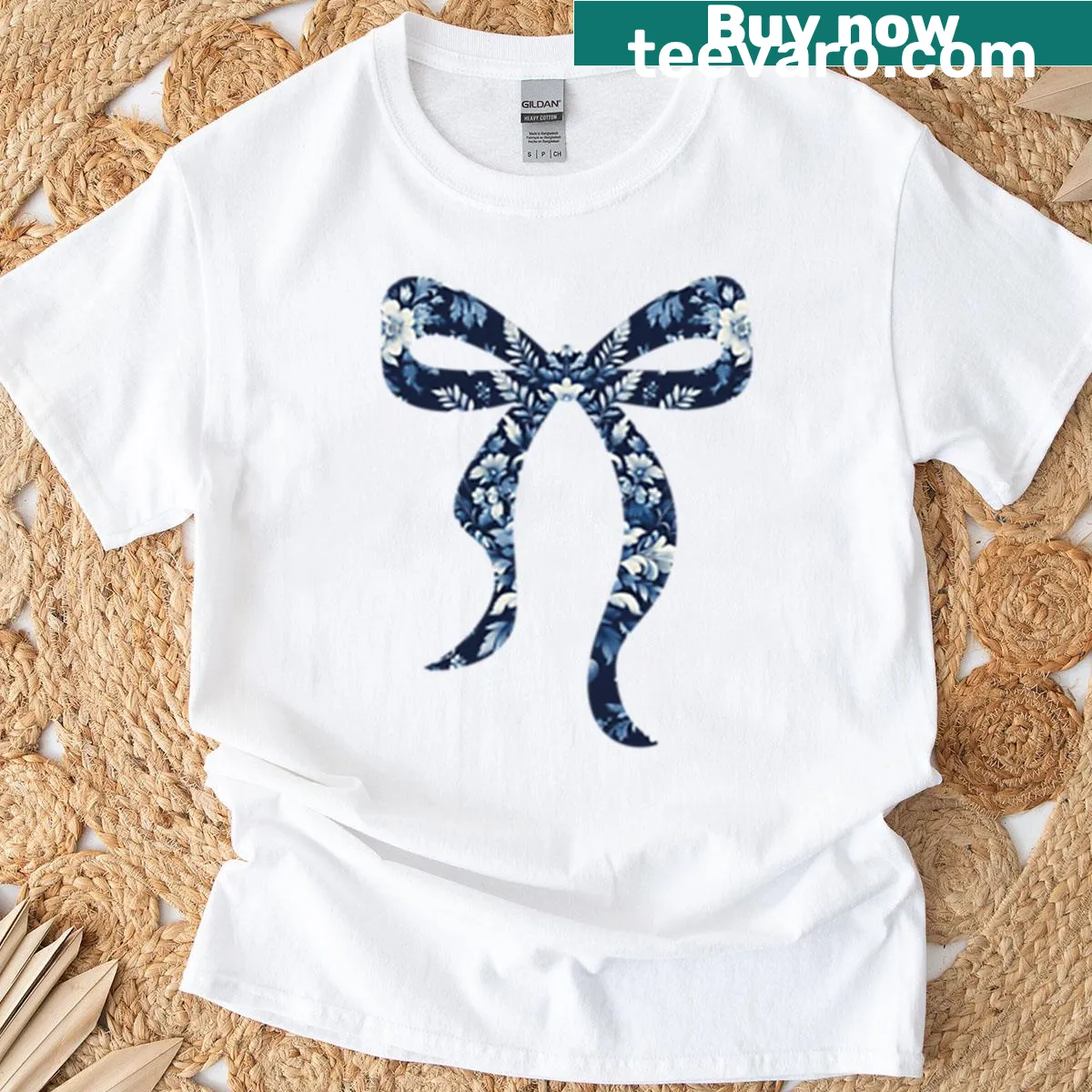 Vintage T-shirt featuring a floral French toile design with a bow — on a men's t-shirt