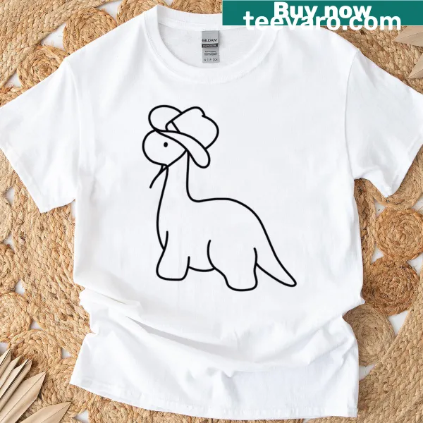 Cartoon dinosaur in cowboy attire graphic on t-shirt