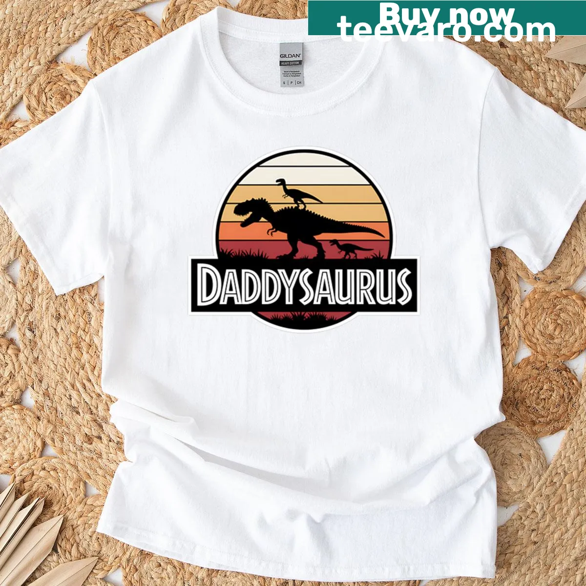 Cartoon Daddysaurus dinosaur graphic t-shirt design — on a men's t-shirt