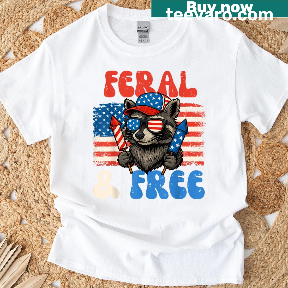Funny raccoon graphic T-shirt with 'Feral And Free' text for Fourth of July — on a men's t-shirt