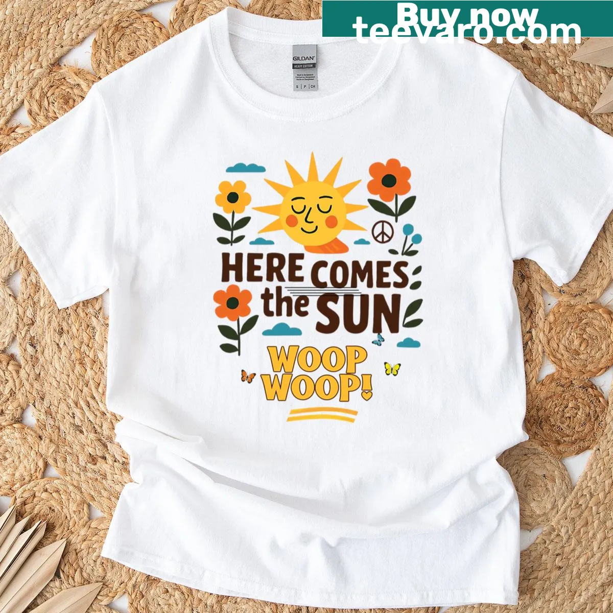 Playful 'Here Comes The Sun' T-shirt with cheerful graphics and fun text — on a men's t-shirt