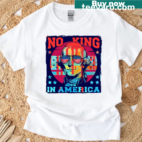 Artistic tee with abstract paint design stating 'No Kings In America'