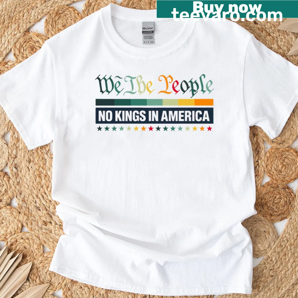 Retro patriotic women's t-shirt with 'We The People' graphic — on a men's t-shirt