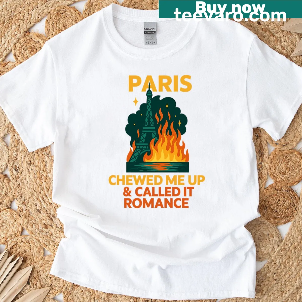 Bold travel poster style T-shirt with 'Paris Chewed Me Up' text — on a men's t-shirt
