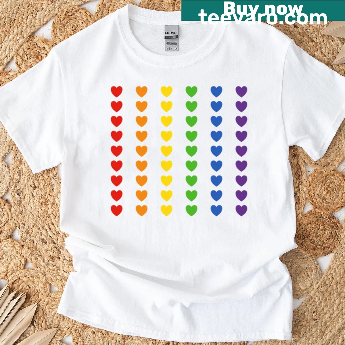 Rainbow flag hearts graphic T-shirt celebrating love — on a men's t-shirt