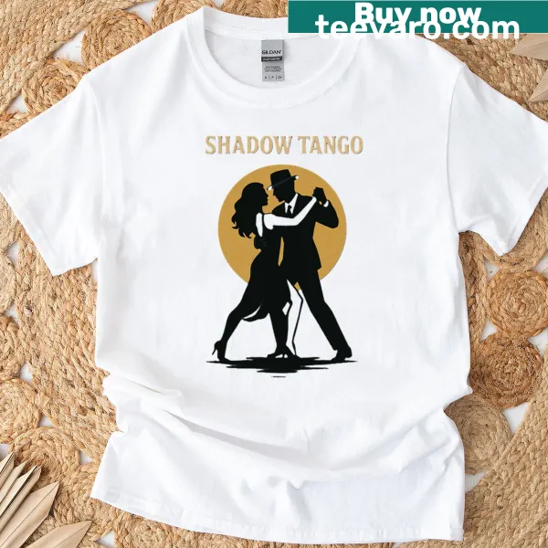 Artful illustration on a t-shirt depicting shadowy figures in a dance