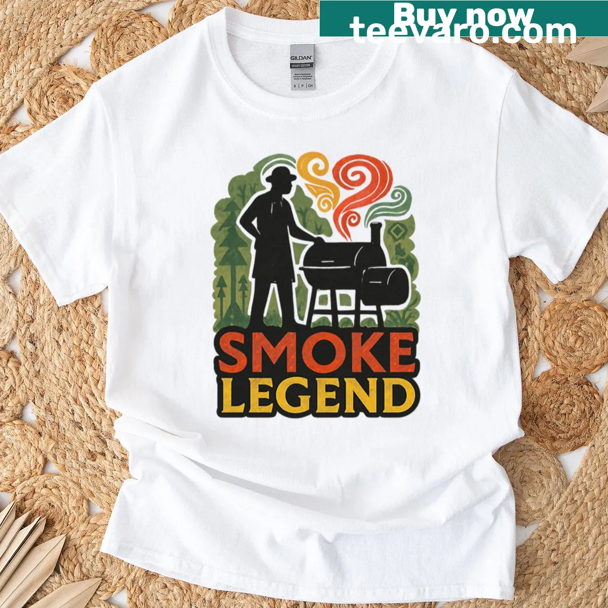 Vintage-style BBQ T-shirt with Rasta stripes and bold graphics for grilling enthusiasts. — on a men's t-shirt