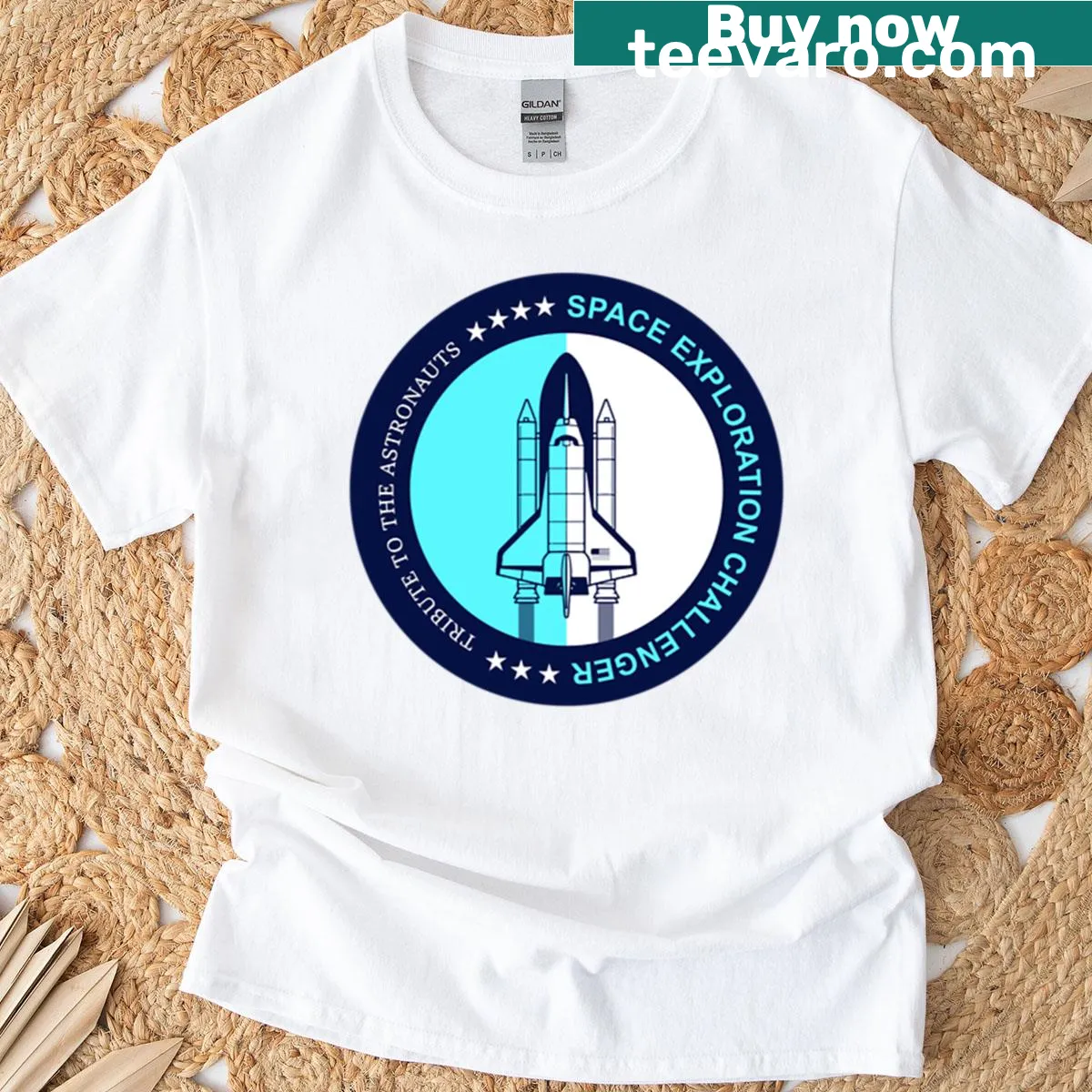 Illustrated emblem T-shirt honoring the Challenger space exploration legacy. — on a men's t-shirt
