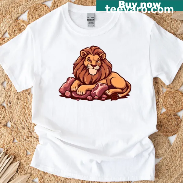 Cartoon lion lying on a pile of meat on a T-shirt.