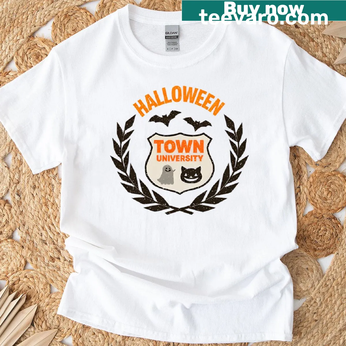 Bat and book badge graphic on a t-shirt — on a men's t-shirt
