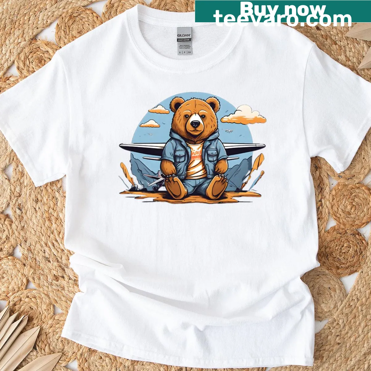 T-shirt featuring a bear next to a vintage airplane illustration — on a men's t-shirt
