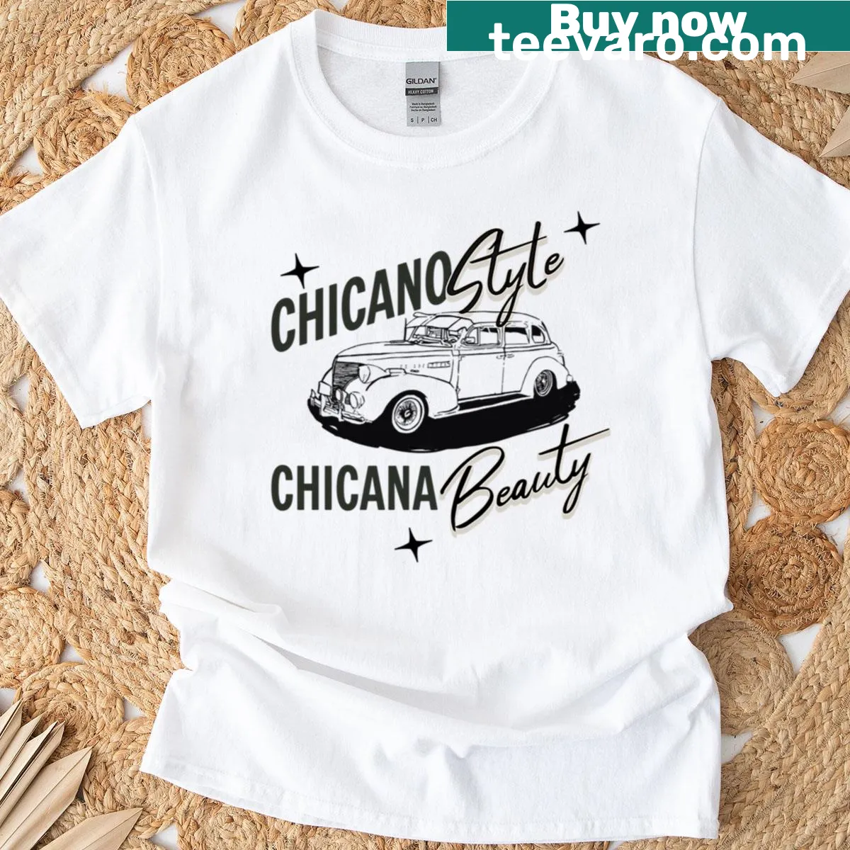 T-shirt featuring Quetzal bird and lowrider imagery celebrating Latino pride — on a men's t-shirt