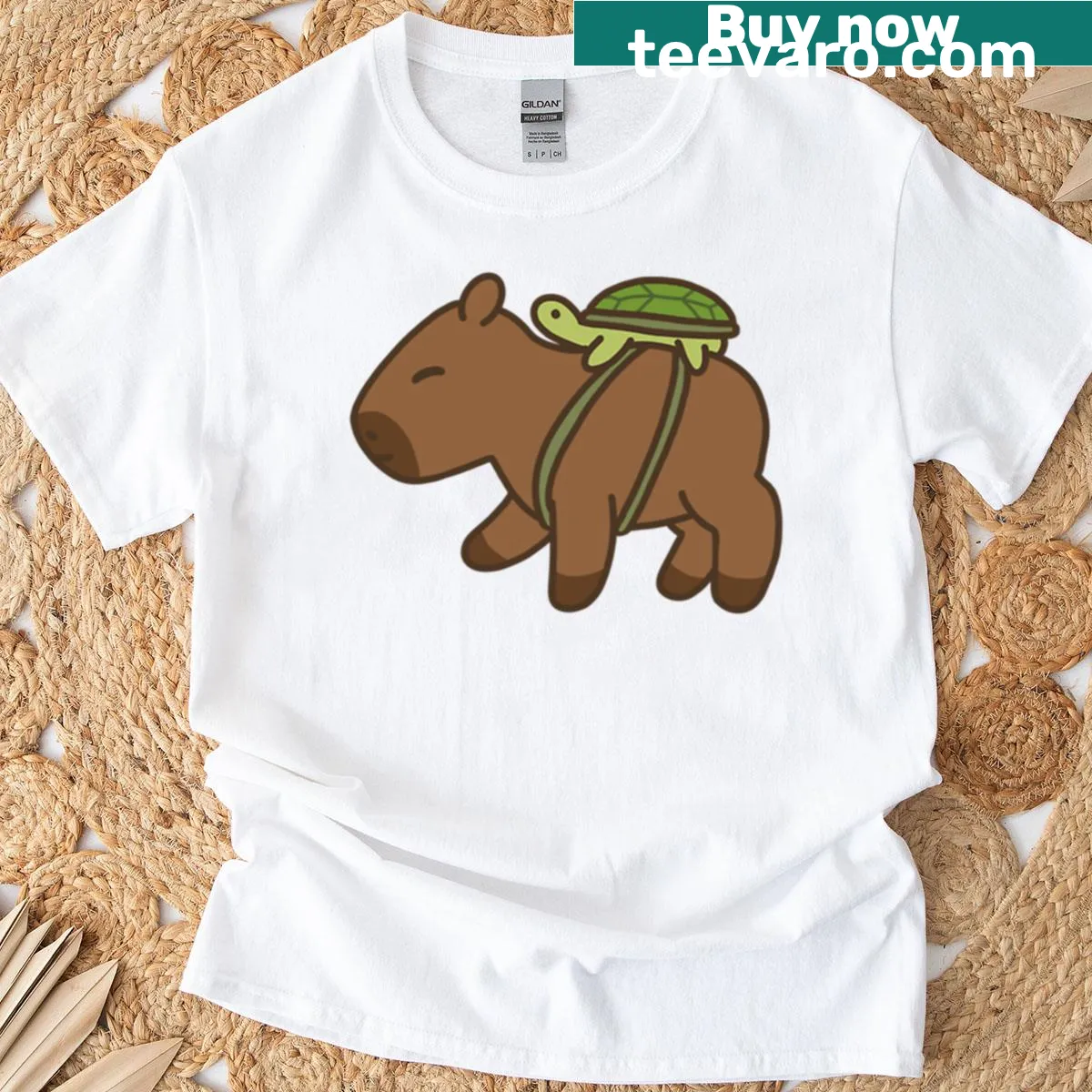 Illustrated T-shirt featuring a capybara with a turtle in a backpack. — on a men's t-shirt
