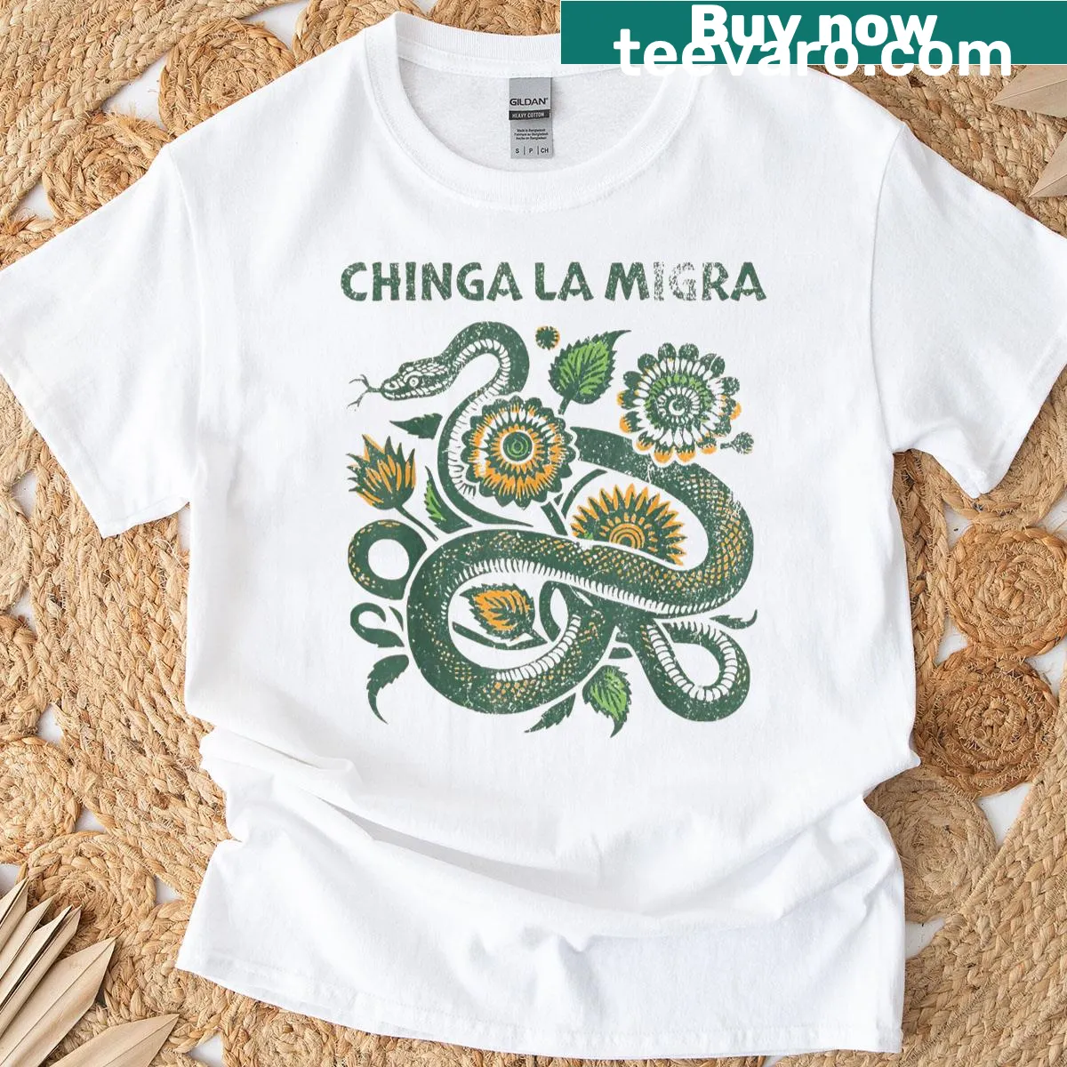 T-shirt with bold 'Chinga La Migra' text promoting human rights — on a men's t-shirt