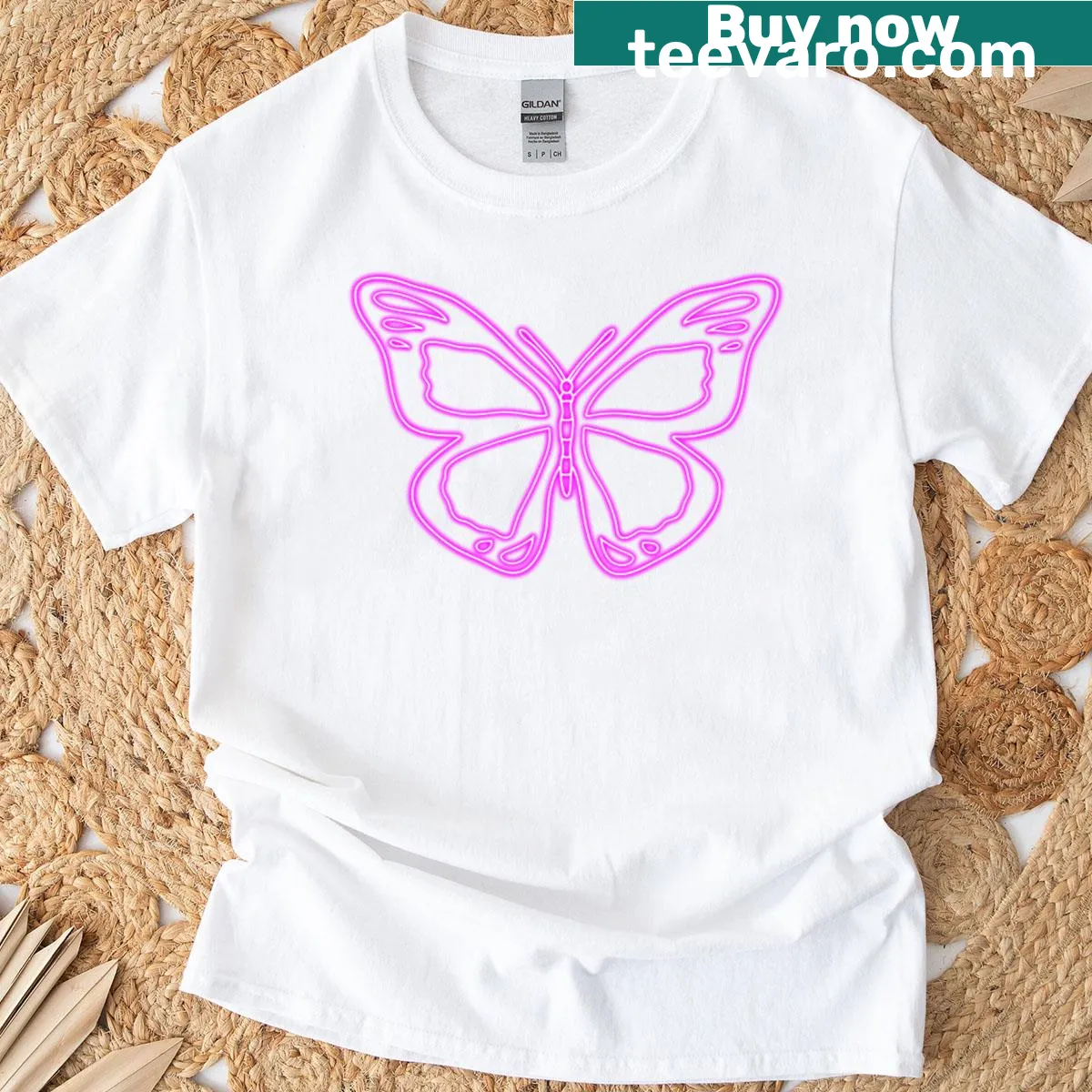 Vibrant neon pink butterfly design on a stylish t-shirt — on a men's t-shirt