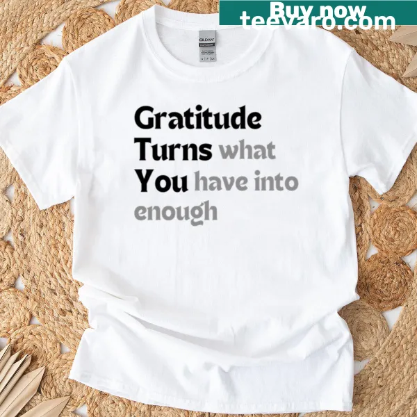 Minimalist design featuring the quote 'Gratitude Turns What You Have Into Enough'