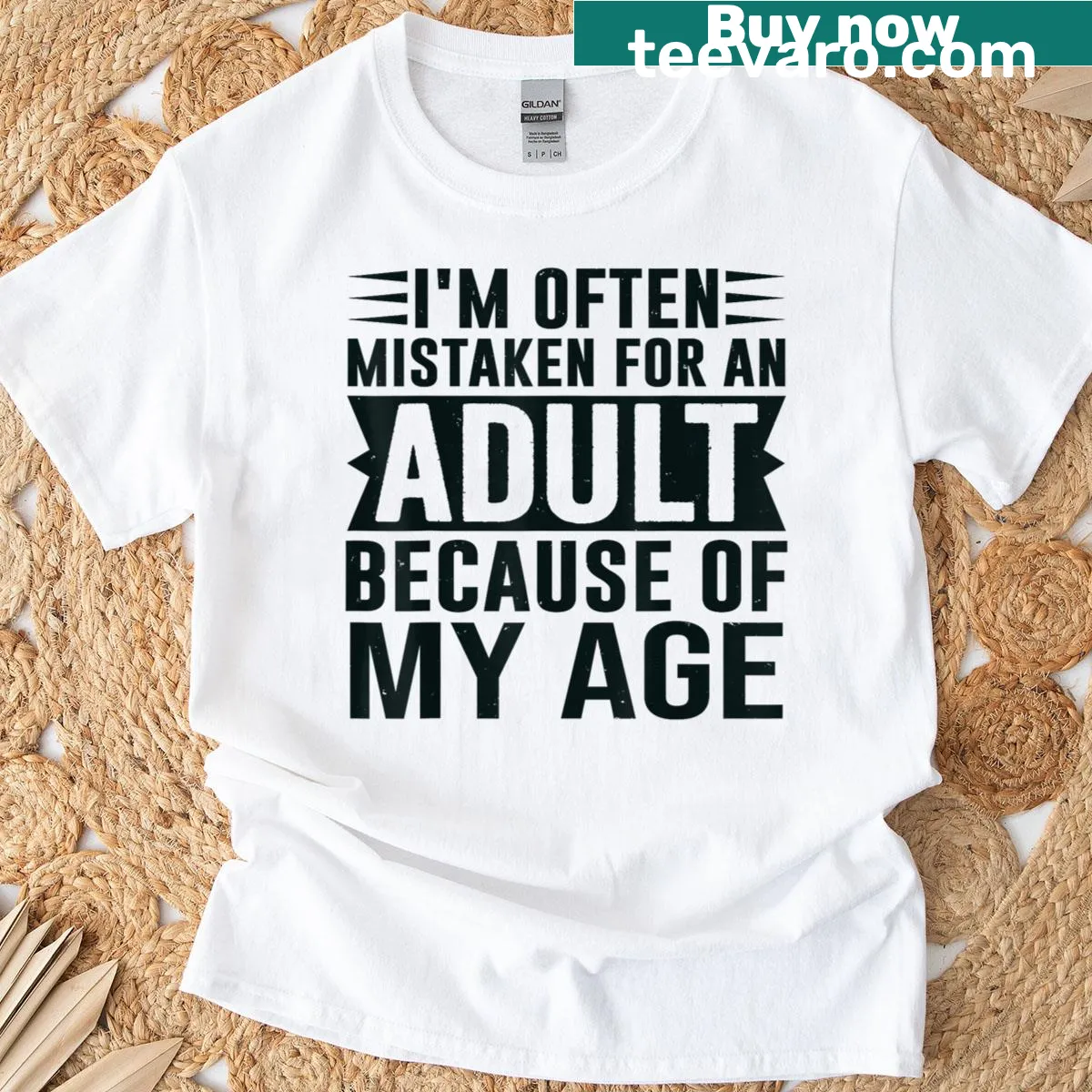 Witty t-shirt with 'Mistaken For An Adult' phrase — on a men's t-shirt