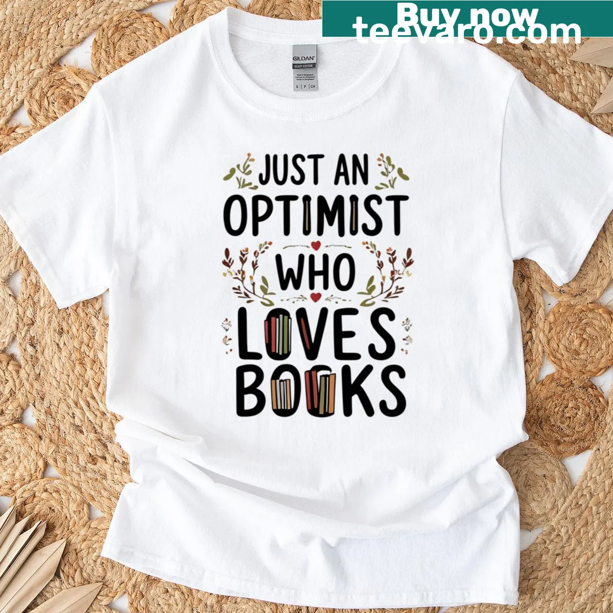 Typography t-shirt with the phrase 'Just An Optimist Who Loves Books' — on a men's t-shirt