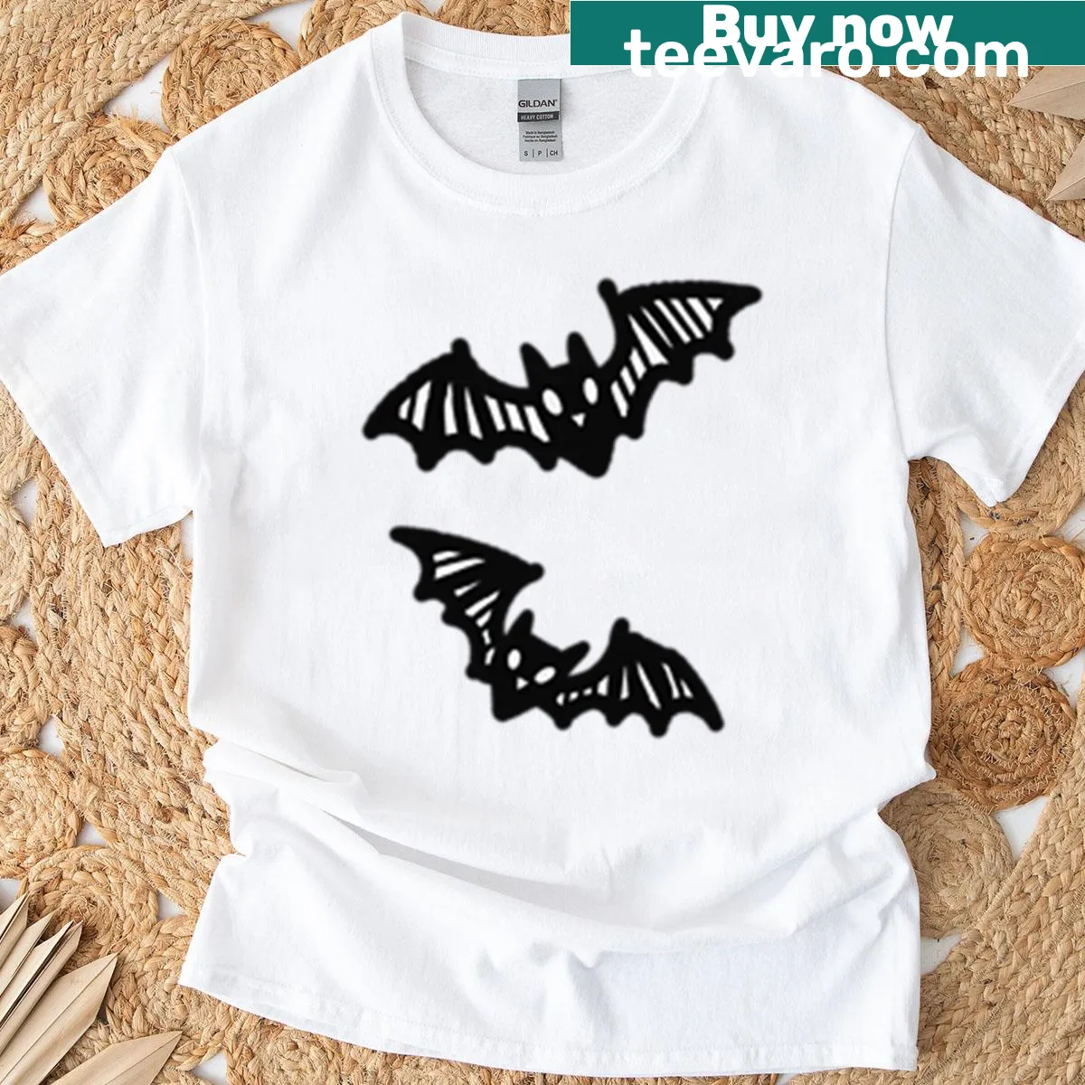 Cute cartoon bats flying on a Halloween-themed t-shirt. — on a men's t-shirt