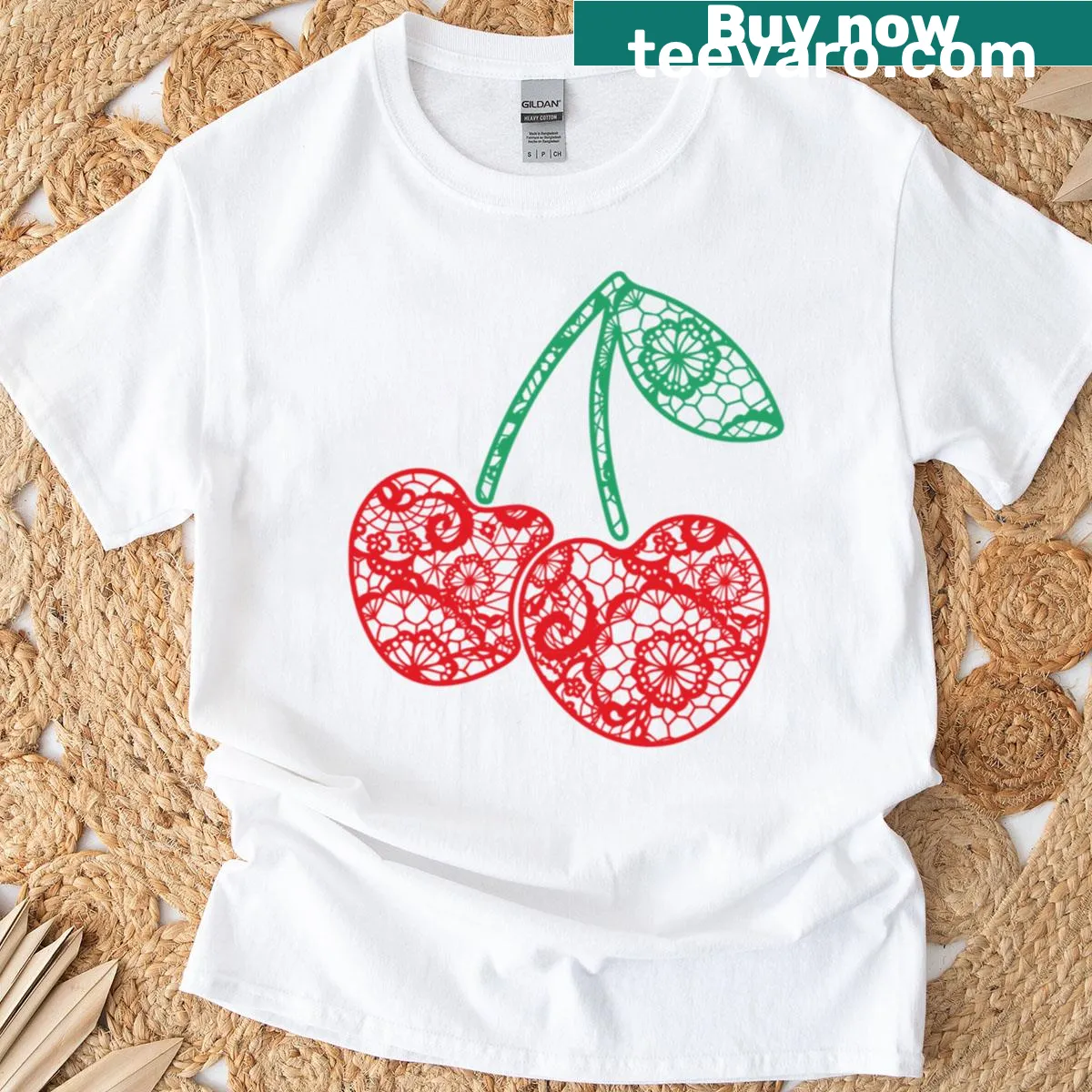 T-shirt featuring lace-patterned cherries illustration — on a men's t-shirt