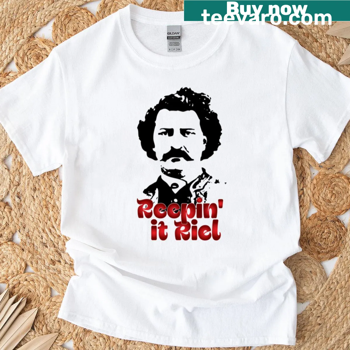 T-shirt featuring a graphic of Louis Riel — on a men's t-shirt