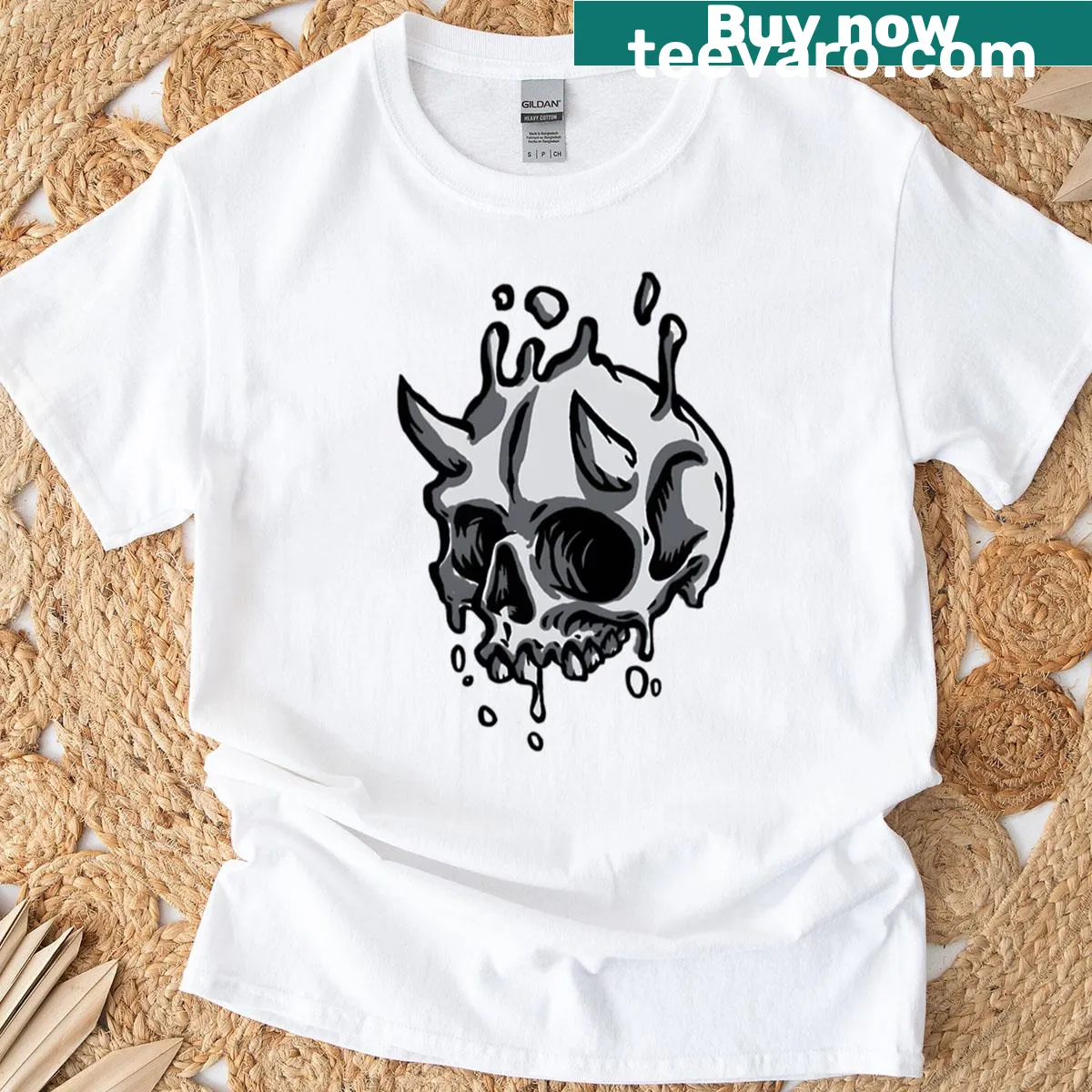 Gothic T-shirt featuring a melting demon skull in horror art style — on a men's t-shirt