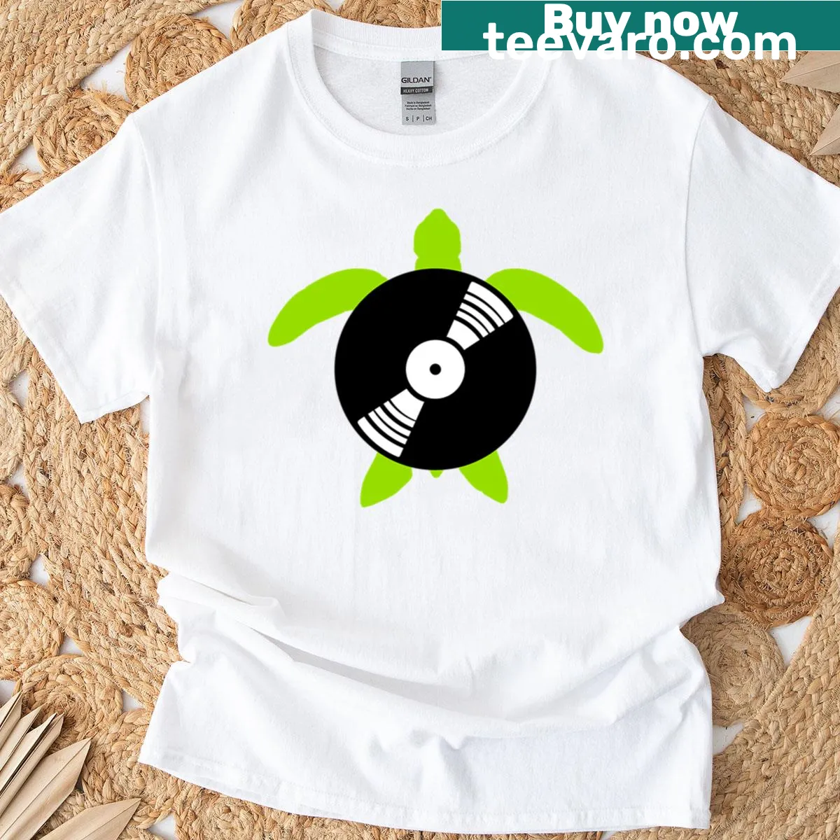 Illustrative t-shirt featuring a turtle with vinyl records and DJ elements — on a men's t-shirt