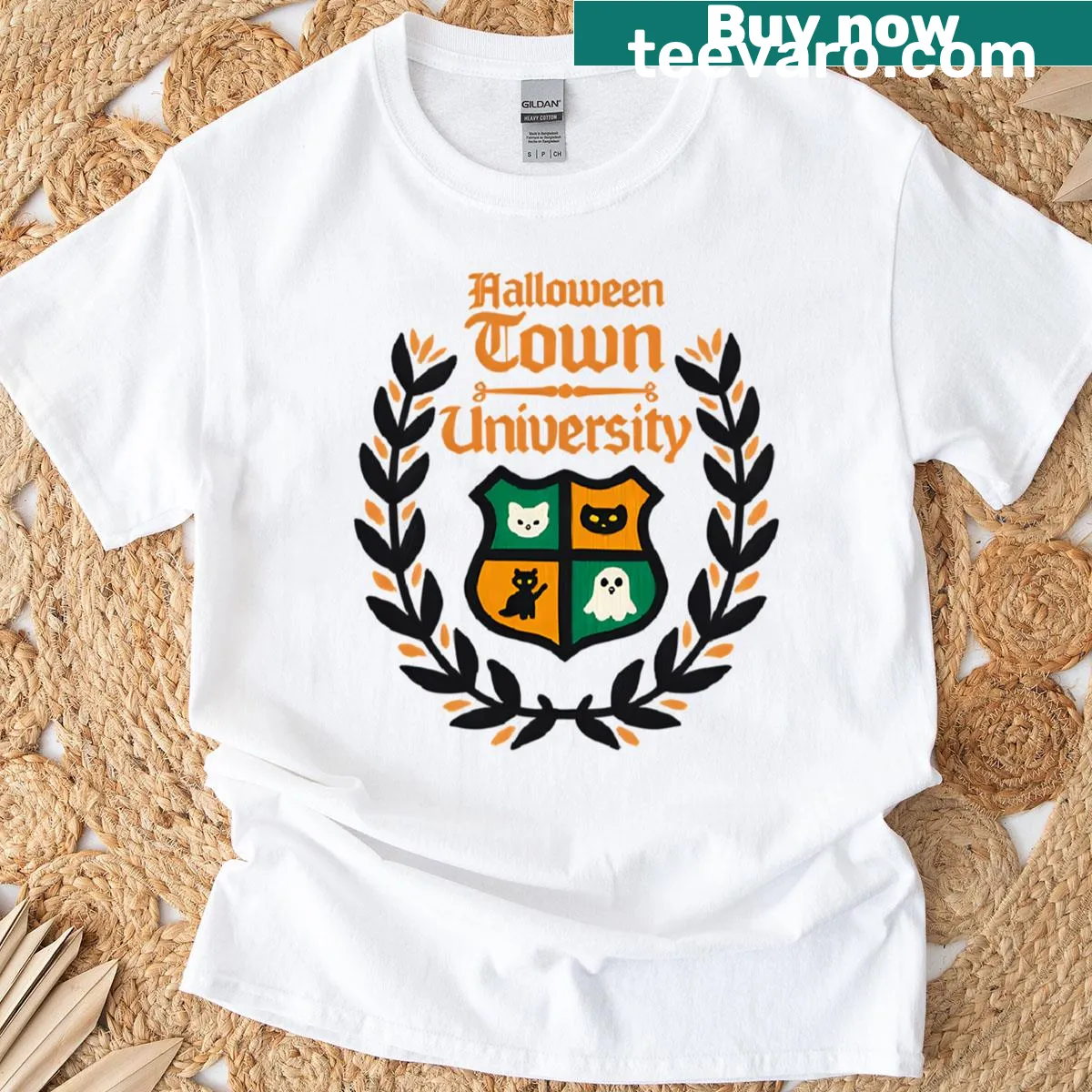 Shield emblem design for a fictional Witchy University — on a men's t-shirt
