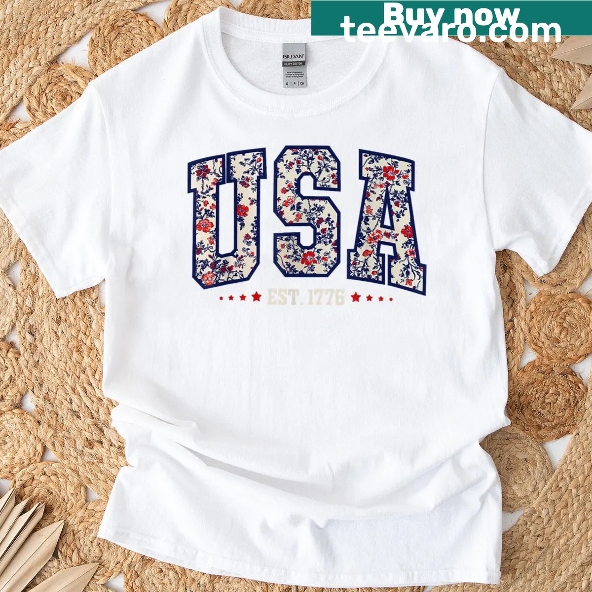Floral T-shirt with 'USA Est 1776' for patriotic women — on a men's t-shirt