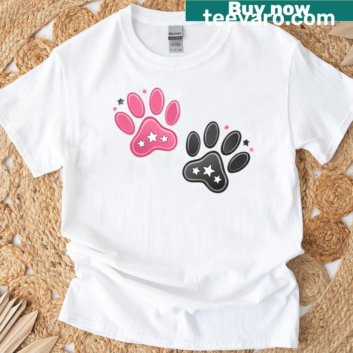 T-shirt featuring paw prints and stars in a playful design — on a men's t-shirt