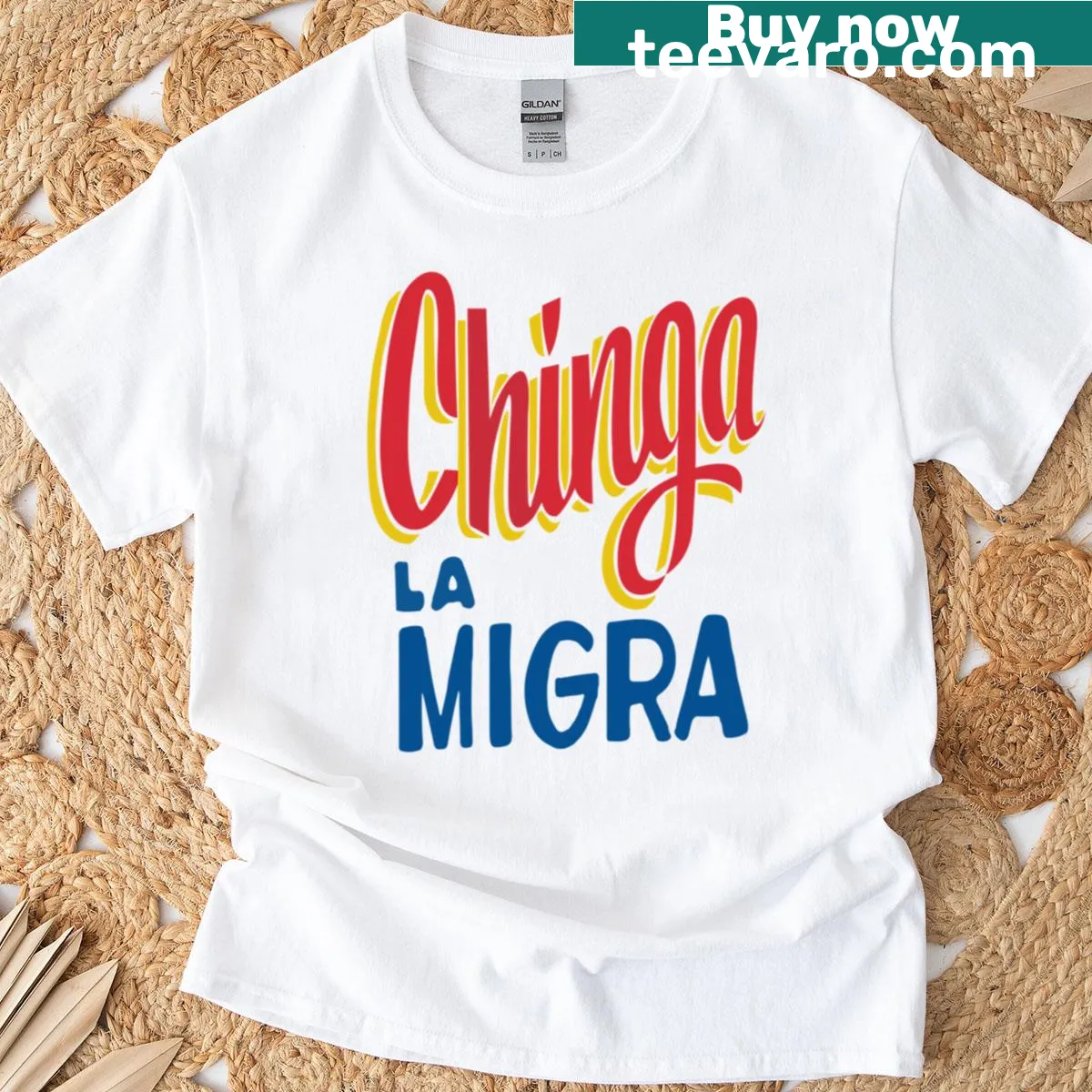 T-shirt with hand-lettered phrase 'Chinga La Migra' — on a men's t-shirt