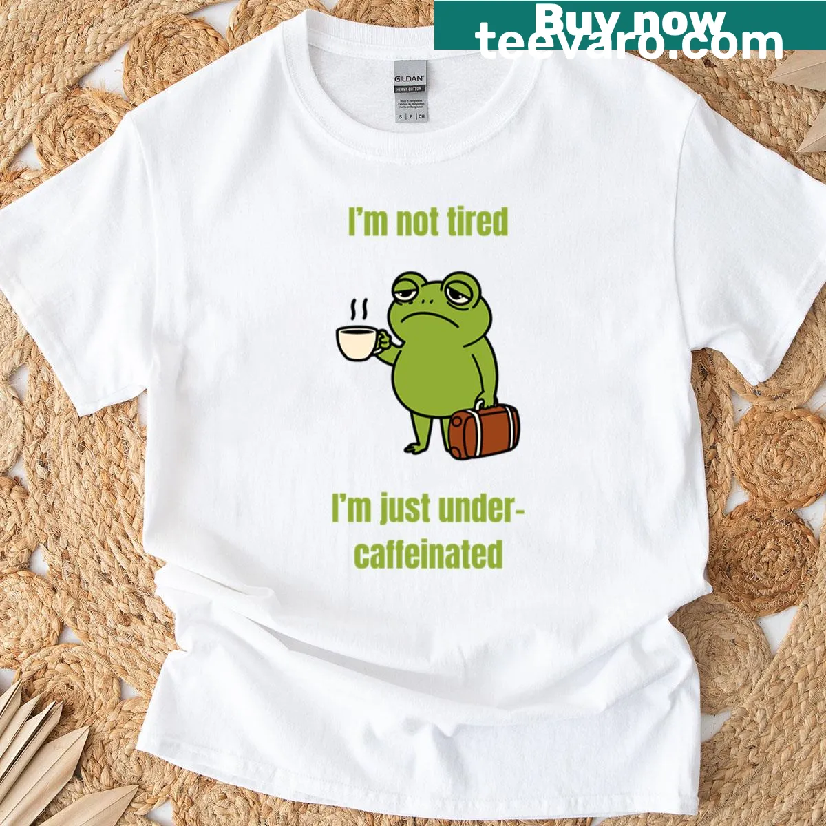 Humorous T-shirt for coffee lovers with the phrase about being under-caffeinated — on a men's t-shirt