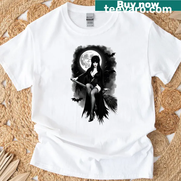 Oversized T-shirt featuring Elvira on a broomstick in a whimsical design