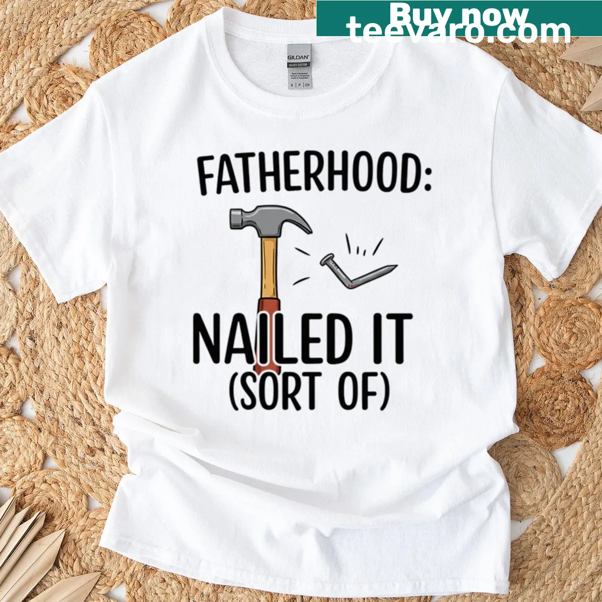 Funny T-shirt for dads with the phrase 'Fatherhood Nailed It Sort Of' — on a men's t-shirt