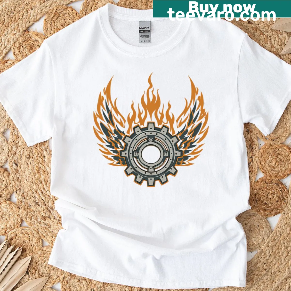 Bold flaming gear emblem with mechanical wings graphic t-shirt — on a men's t-shirt