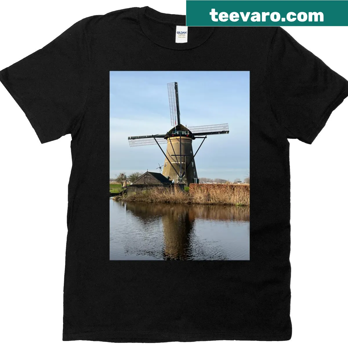 T-shirt depicting Kinderdijk windmills in a scenic landscape — on a men's t-shirt