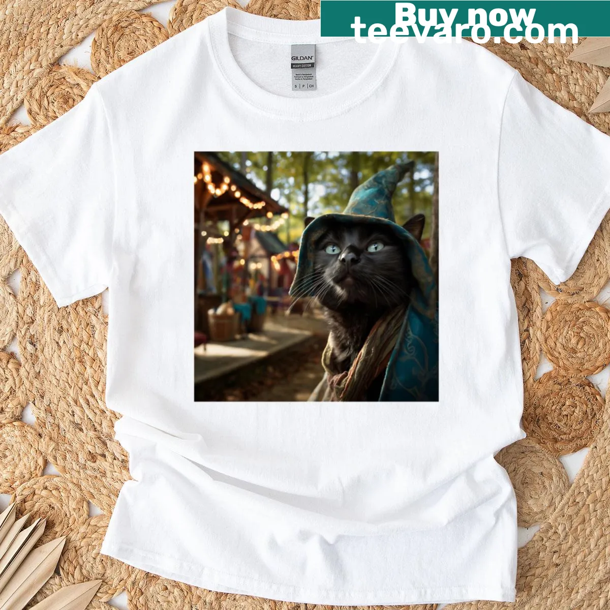 Oversized t-shirt featuring whimsical renaissance cats graphic — on a men's t-shirt