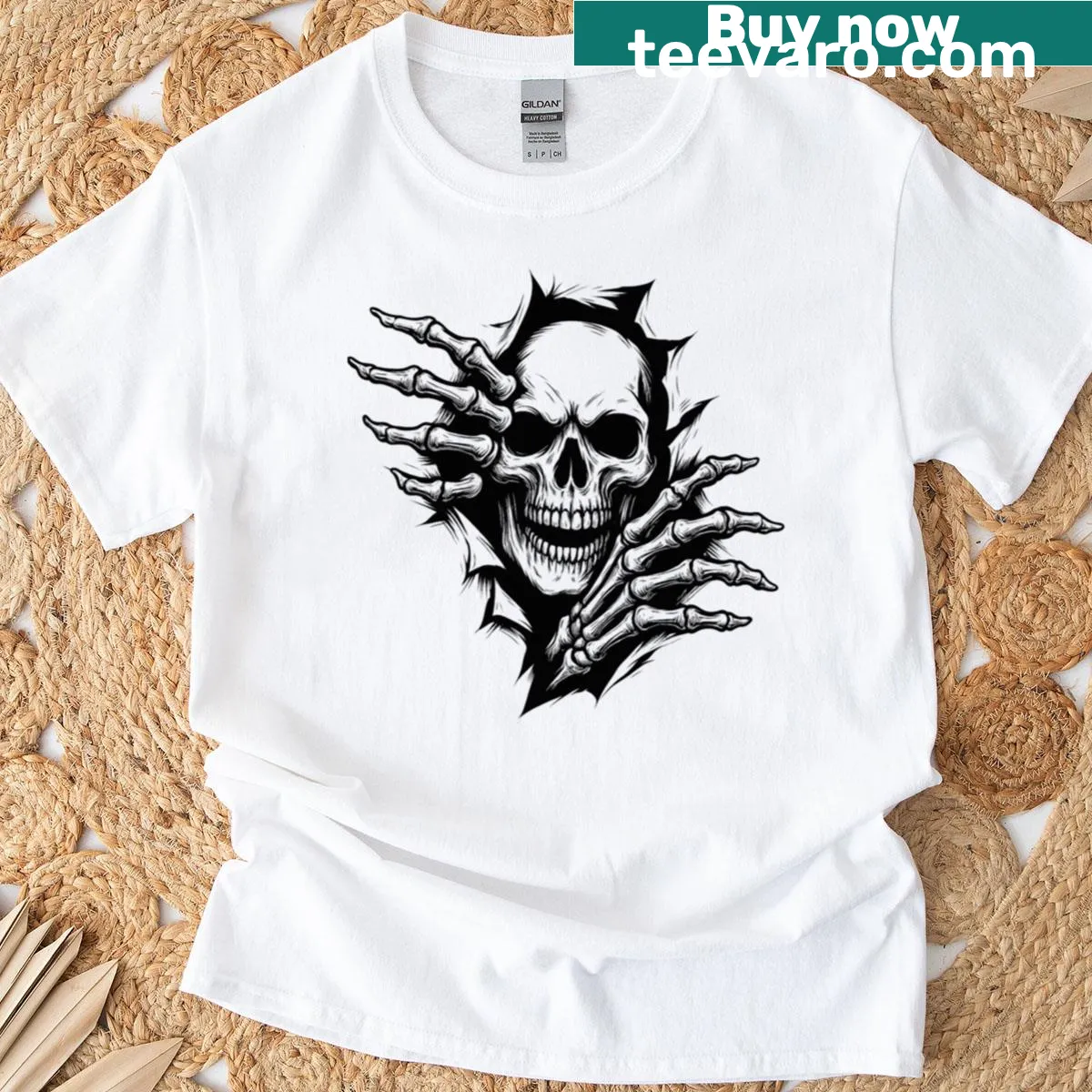 Skull tearing through a page graphic T-shirt — on a men's t-shirt
