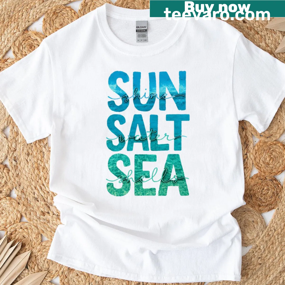 T-shirt featuring a playful graphic of sun, sand, and salt — on a men's t-shirt