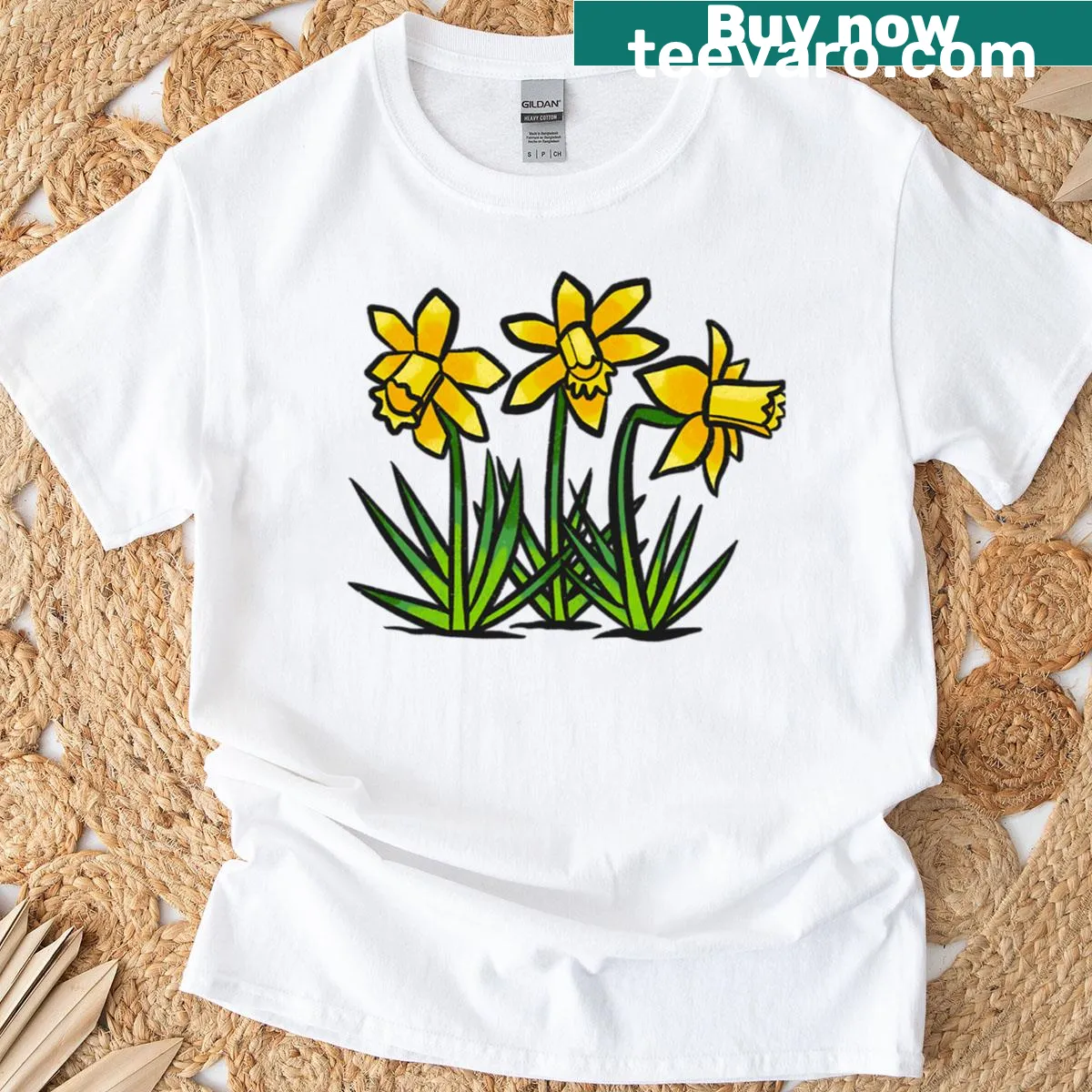 Nature-themed t-shirt featuring a yellow narcissus flower illustration — on a men's t-shirt